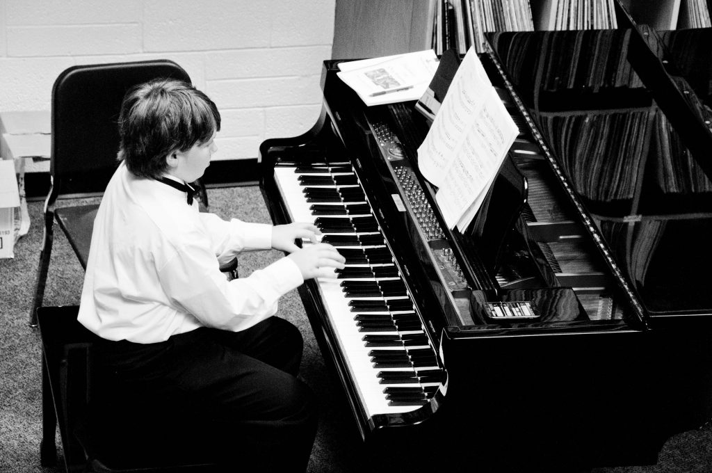 A piano student performing, which is a practice that battles stage fright.